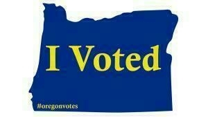 A blue silhouette of the state of Oregon features the text "I Voted" in yellow and "#oregonvotes" in the bottom corner.